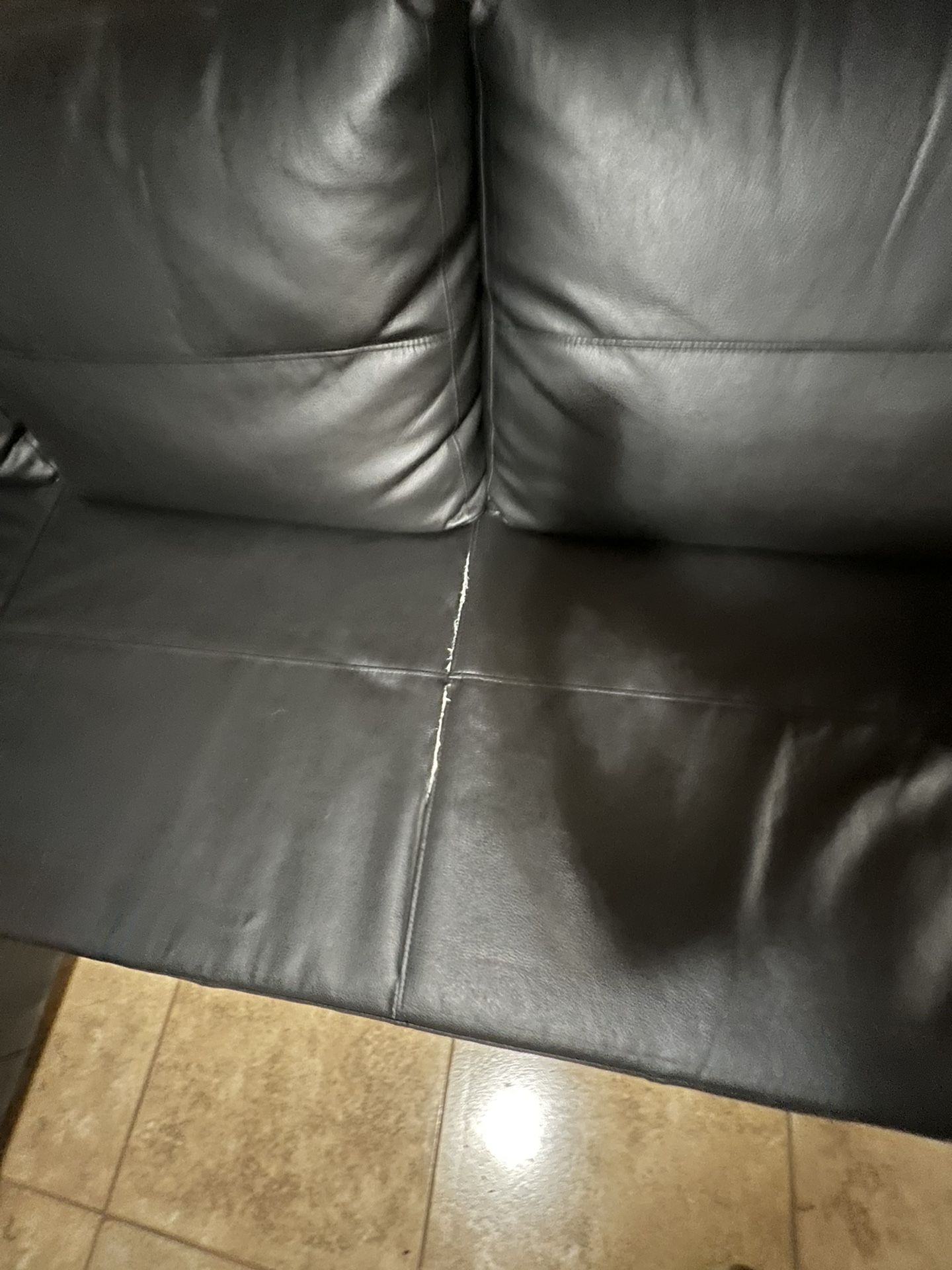 Black leather couch- $100 OBO