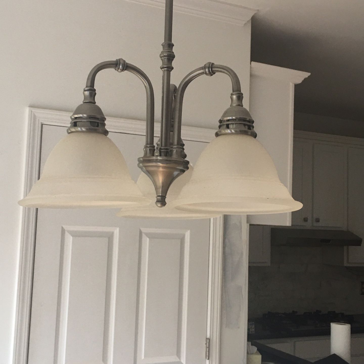 One Nickle and Frosted Glass Light Fixtures