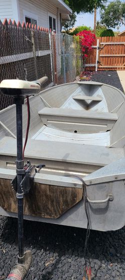 14 ft Sears aluminum boat w/folding trailer and extras. Thumbnail
