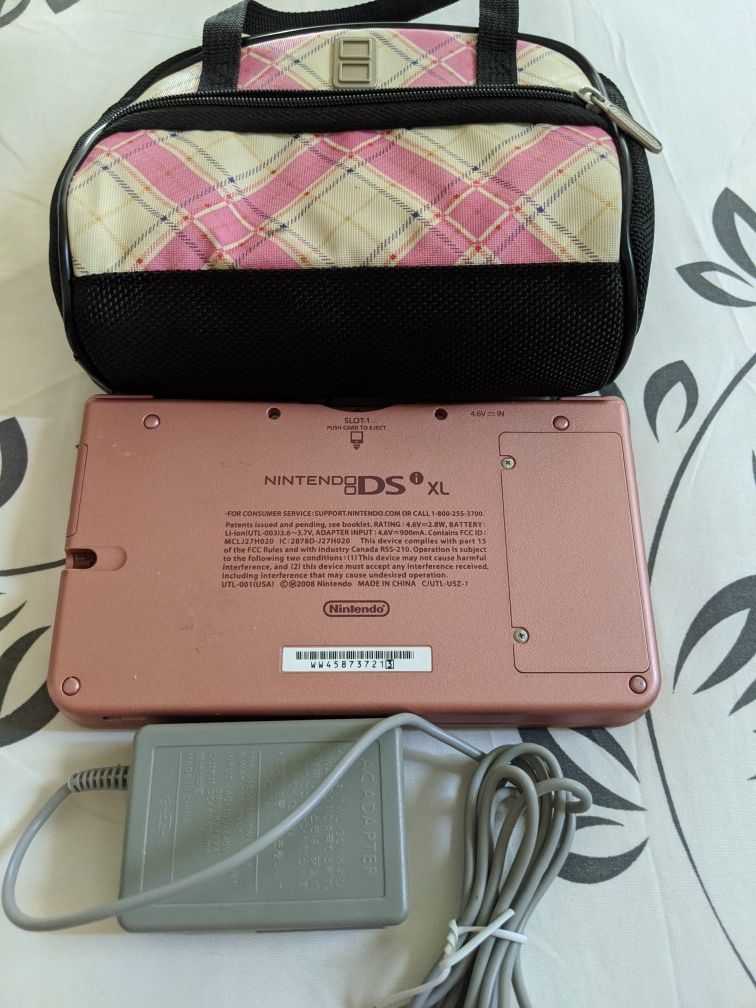 Nintendo Dsi XL, charger and accessory case in coral