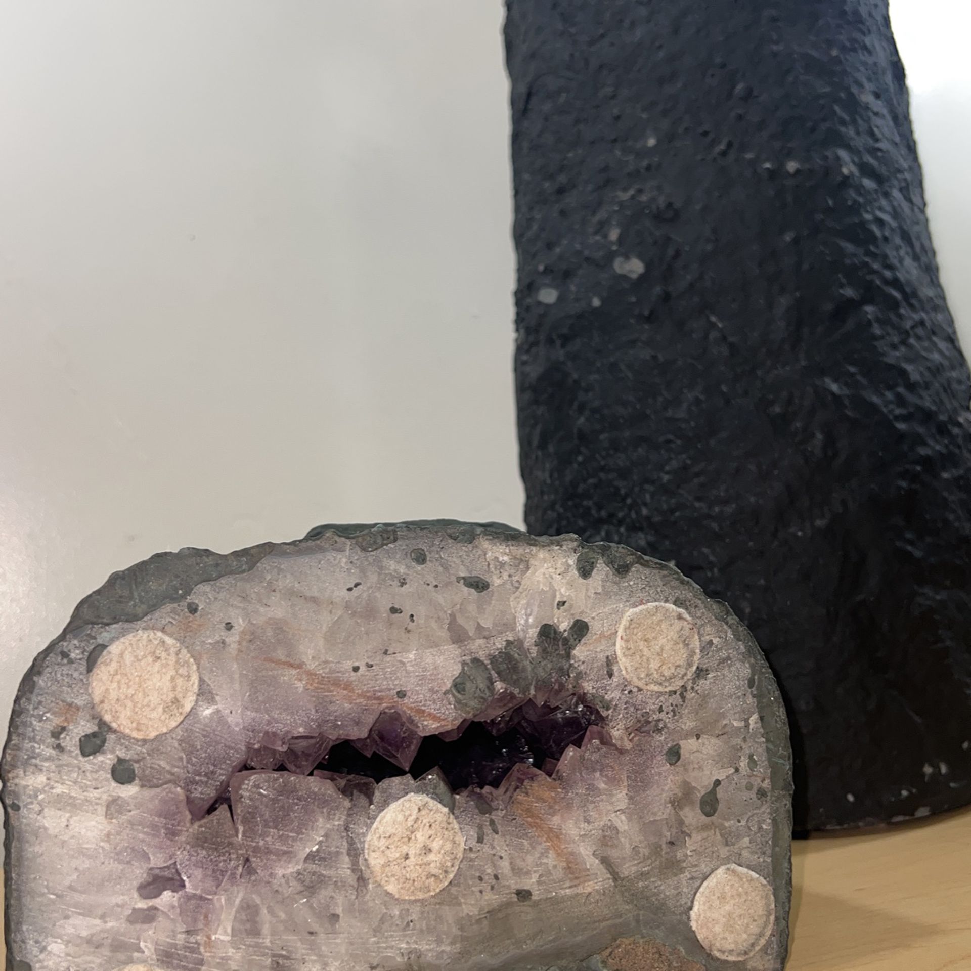 Set of two purple amethyst crystal geodes