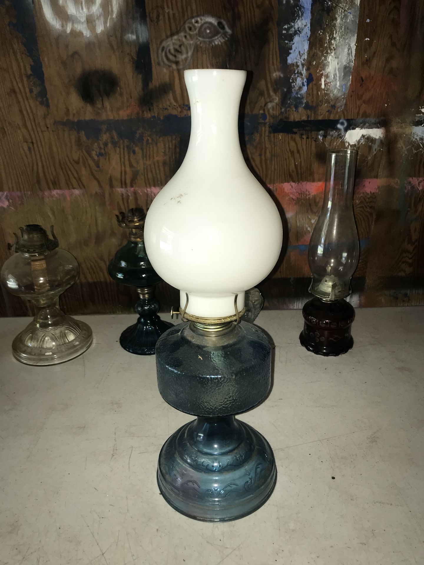 Large teal vintage hurricane lamp