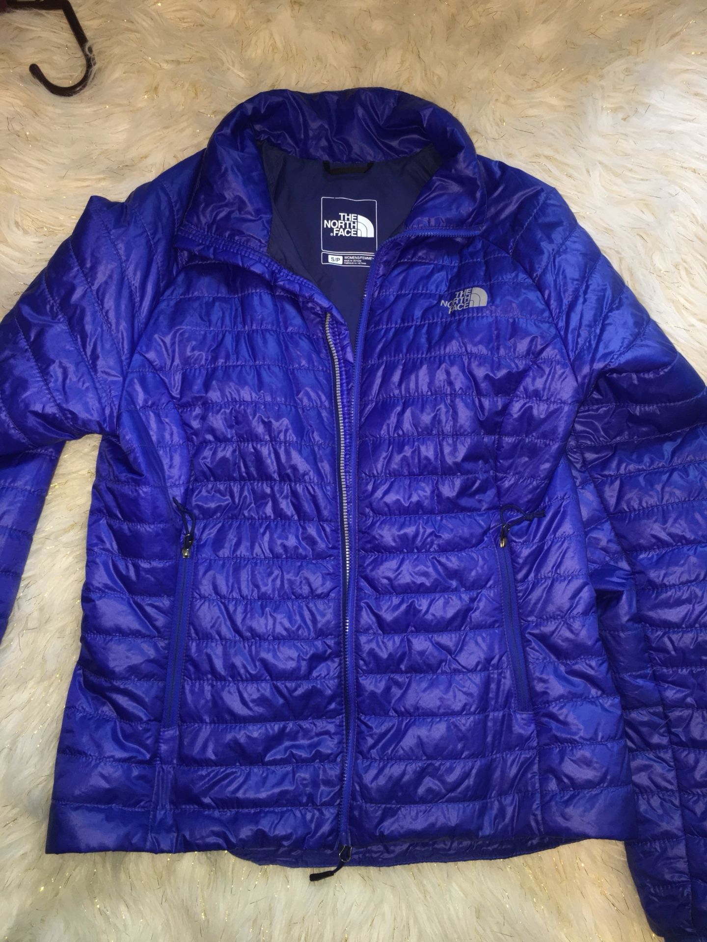 blue north face jacket