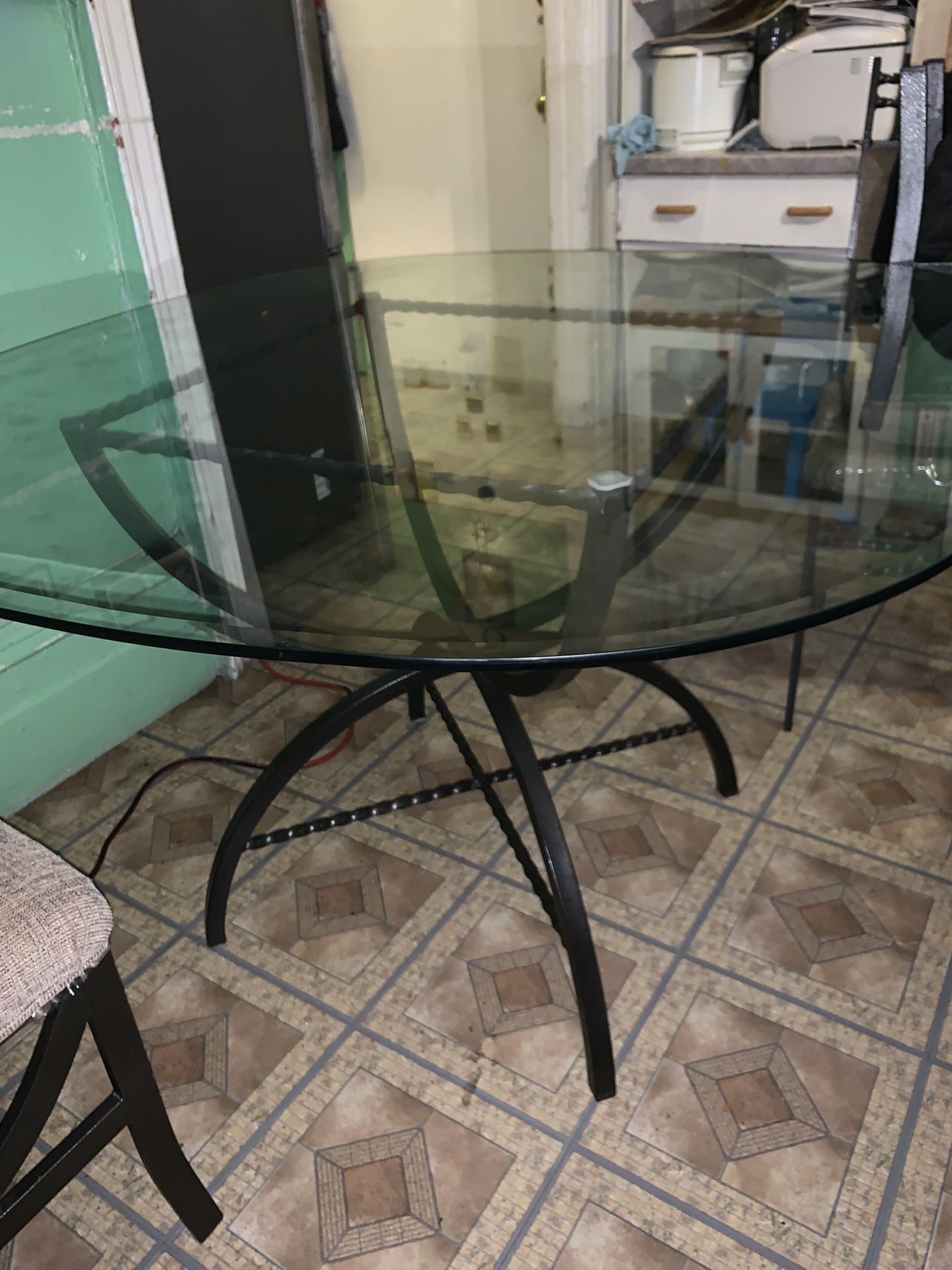 4 chairs plus glass Table