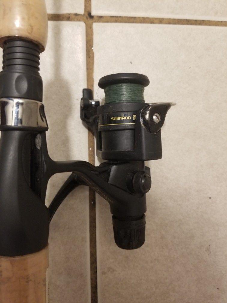 fishing pole with reels both are ugly stik & Eagle claw reels are pflueger penn shimano both ugly stik 7ft & 6"6ft nice set up