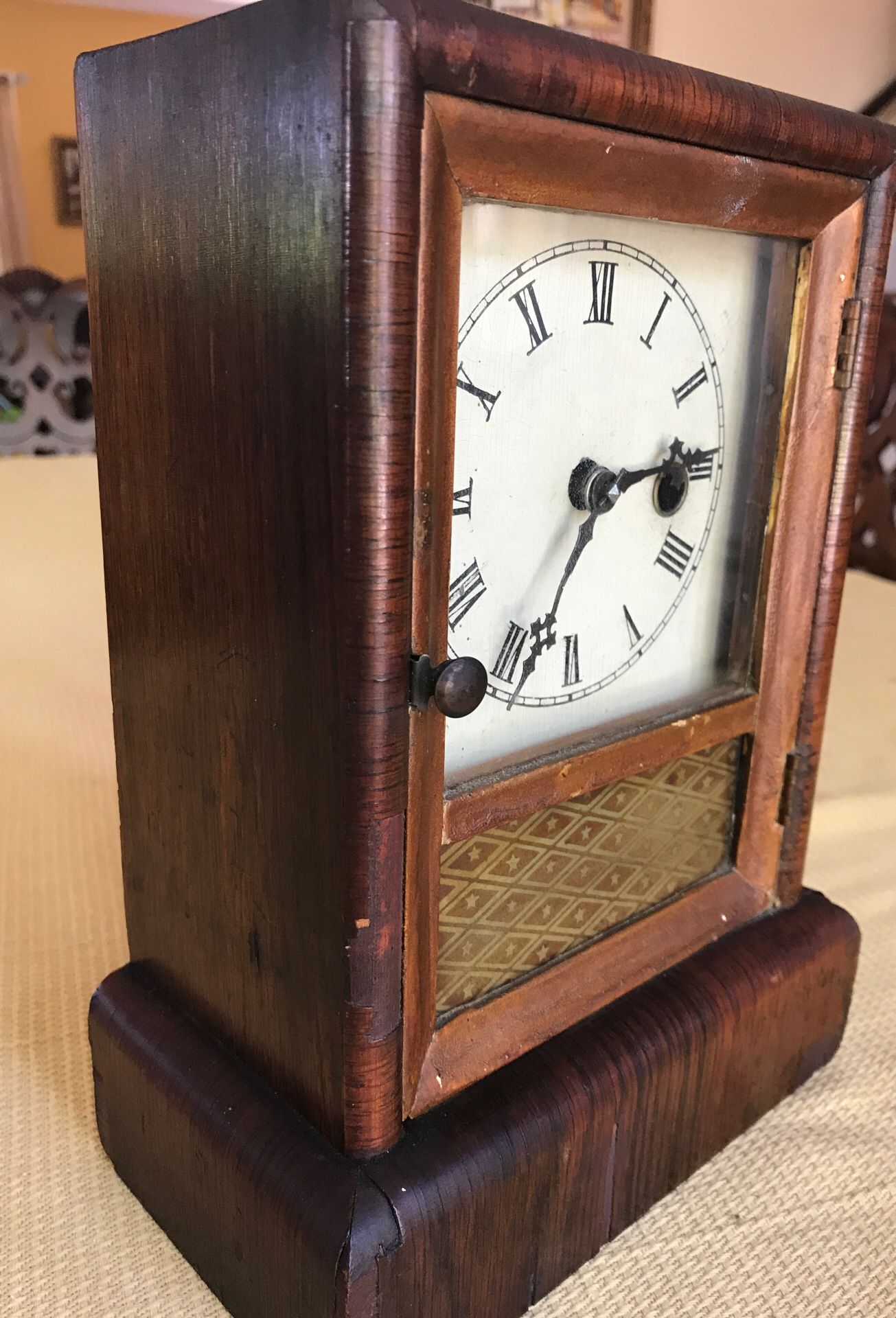 Antique wind up clock by Jerome and company manufactures of eight and