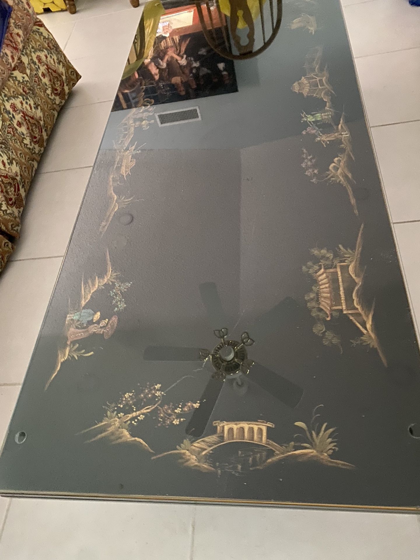 Oriental Coffee Table hand painted with a Glass protective top, in Excellent Condition asking $500. Obo Today…