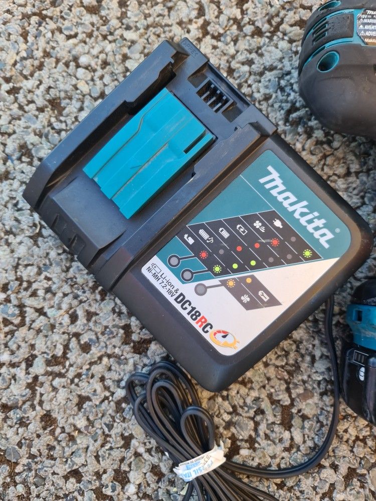 Makita 18-Volt LXT Lithium-Ion Brushless Cordless High Torque 1/2 in. Square Drive Impact Wrench w/ (1) Battery And Charger.