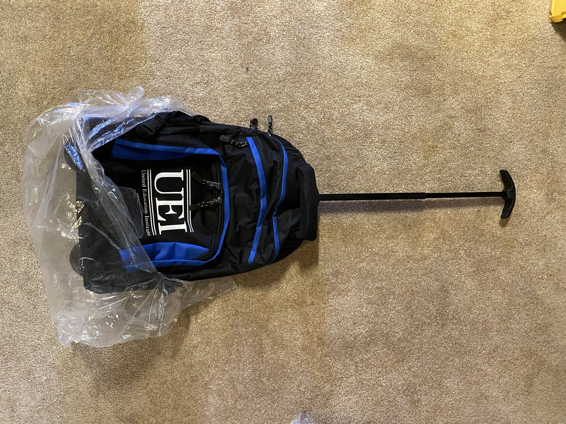 Backpack Rolling Luggage UEI Black Blue Carrying Bag 19” H x 13”  W