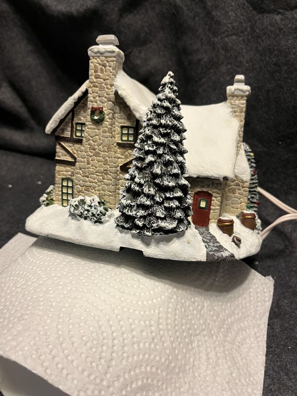 7 “Thomas Kinkade ‘s “ Village Christmas Collection , Each Come with cord that allows them to light up with switch
