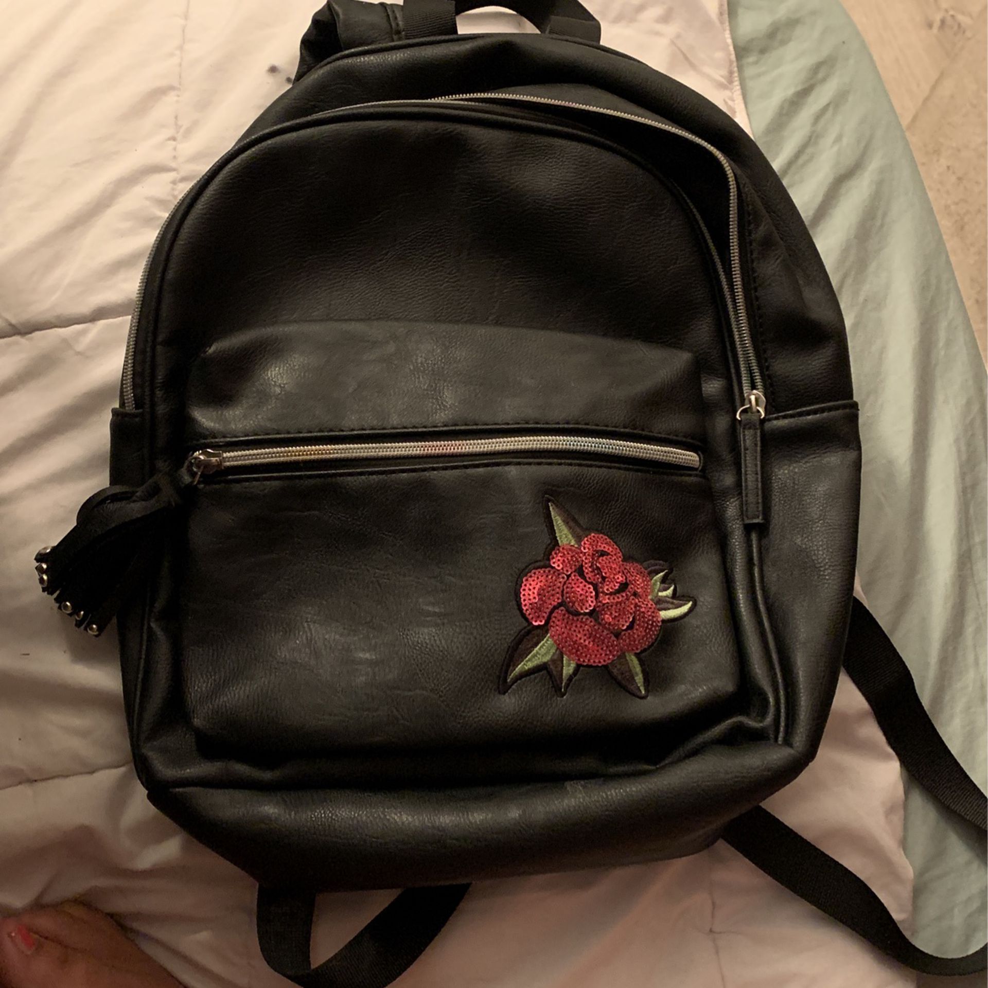 Medium black backpack with rolls