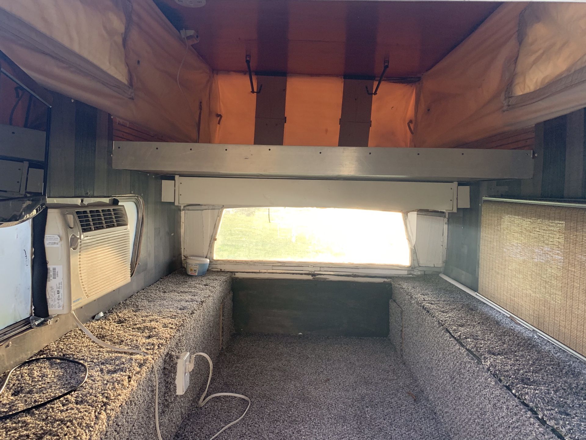 Pop up truck bed camper topper