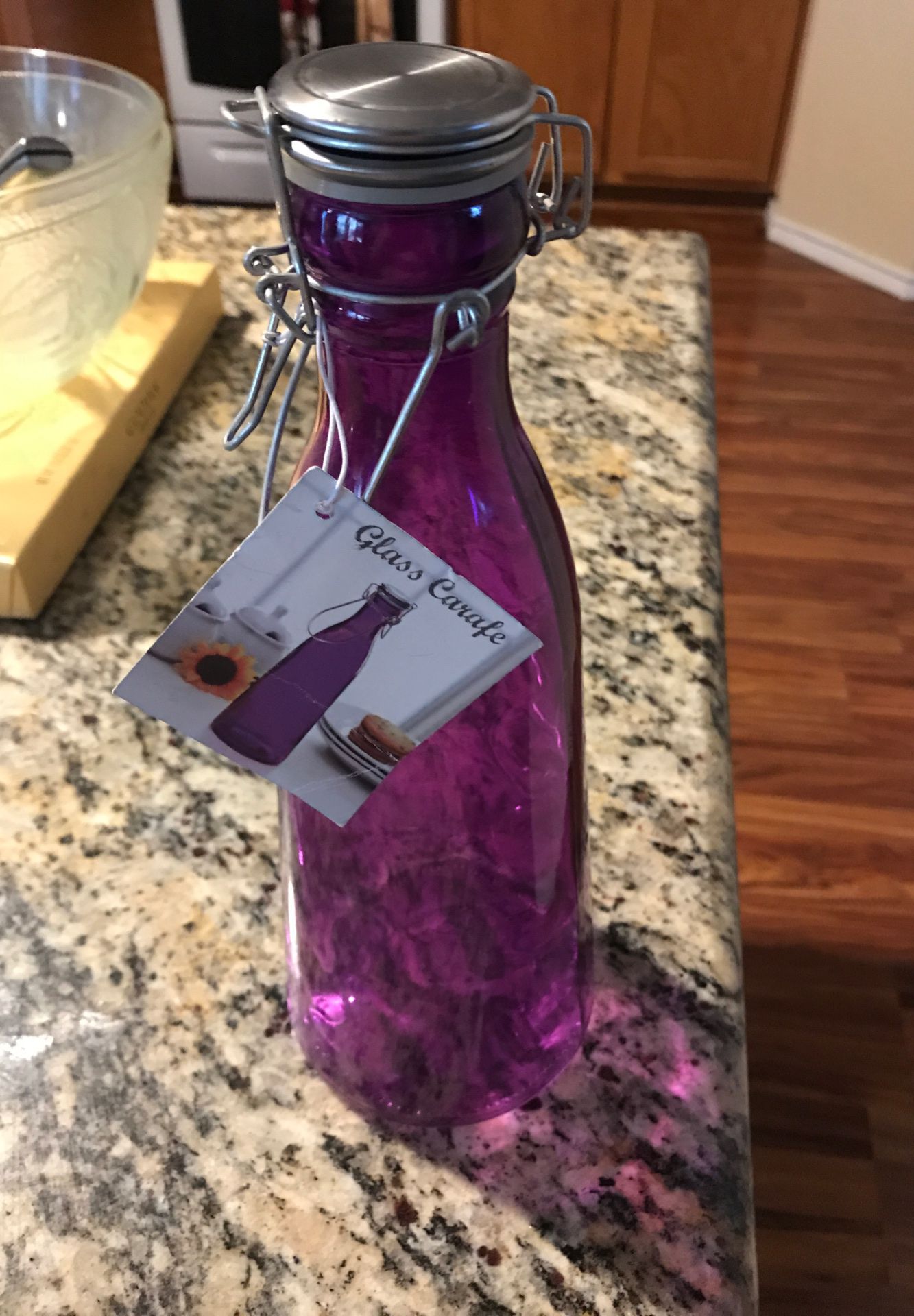 New purple glass carafe with lid and handle