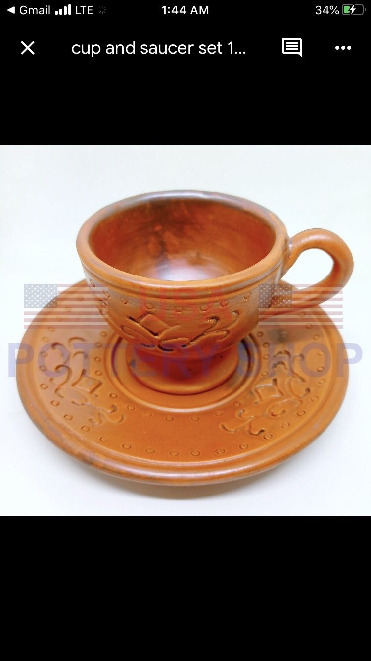 Handmade Pottery tea/coffee cup and saucer.