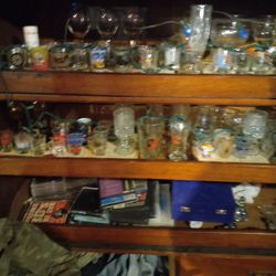 Glass Barware, 100 + Shot Glasses,  Crystal Decanters,  Gold Rimmed Rocks Glasses,  Beer Steins, Crystal Champagne  Flutes, A Lot More Thumbnail
