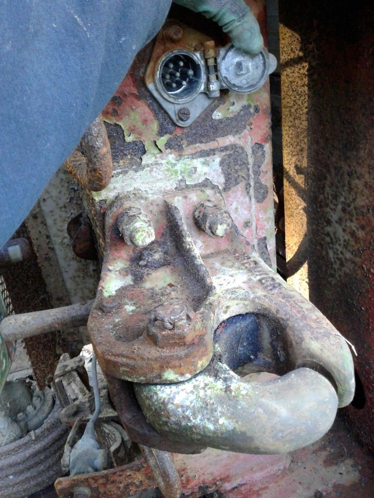 Parting out old semi trailer.
