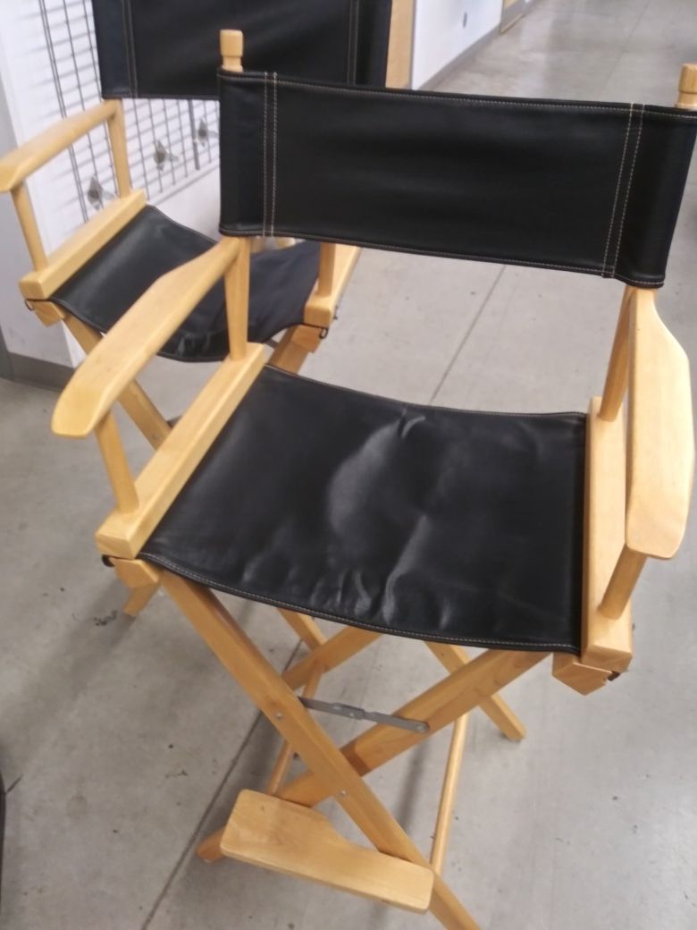 Very nice director chairs with extra brown interchangeable chair covers
