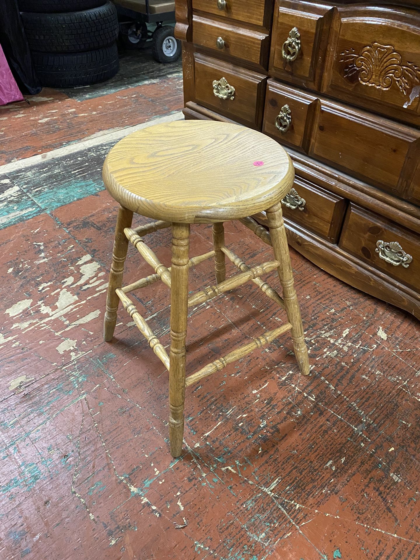 Wooden Stool in Light Finish. 16.5”L x 16.5”W x 23.5”H.