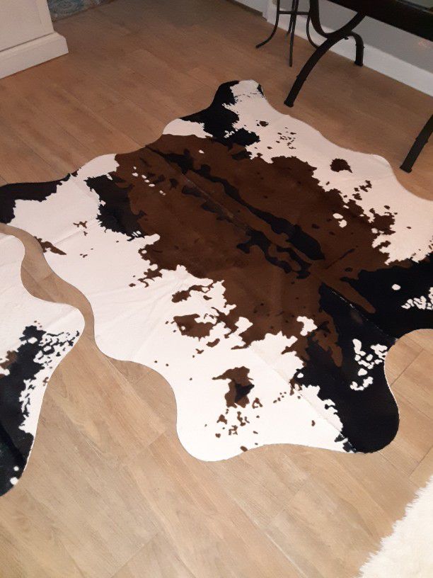 NativeSkins Faux Cowhide Rug (4.6ft x 5.2ft) - Cow Print Area Rug for a Western Boho Decor - Synthetic, Cruelty-Free Animal Hide Carpet with No-Slip B