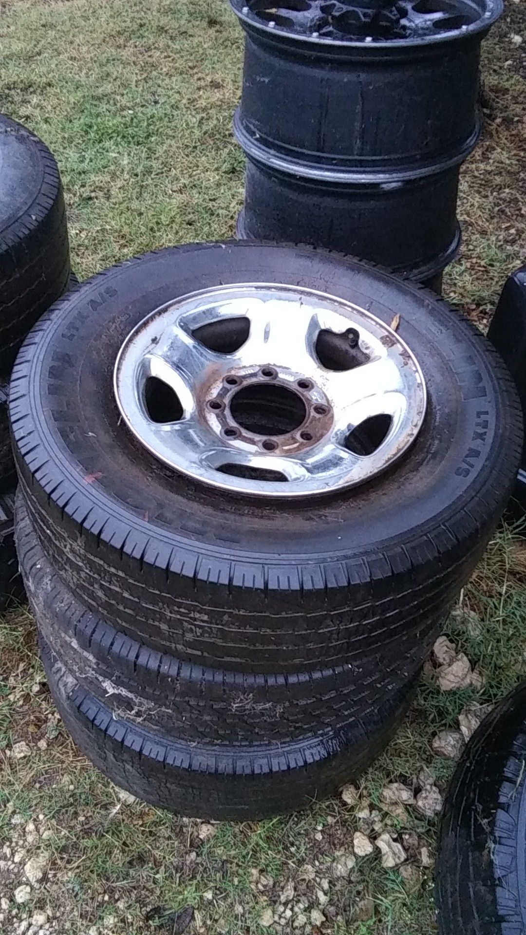 Dodge 8 lug stock rims and a spare tires bald rims great just muddy
