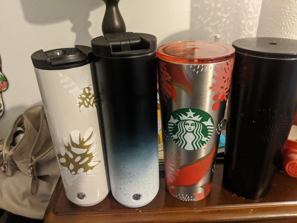 Starbucks tumblers.. Solid Black One Is Sold
