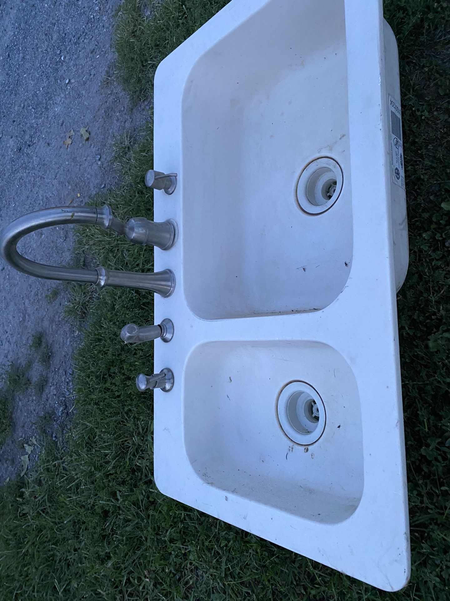 Corian double bowl kitchen sink and faucet