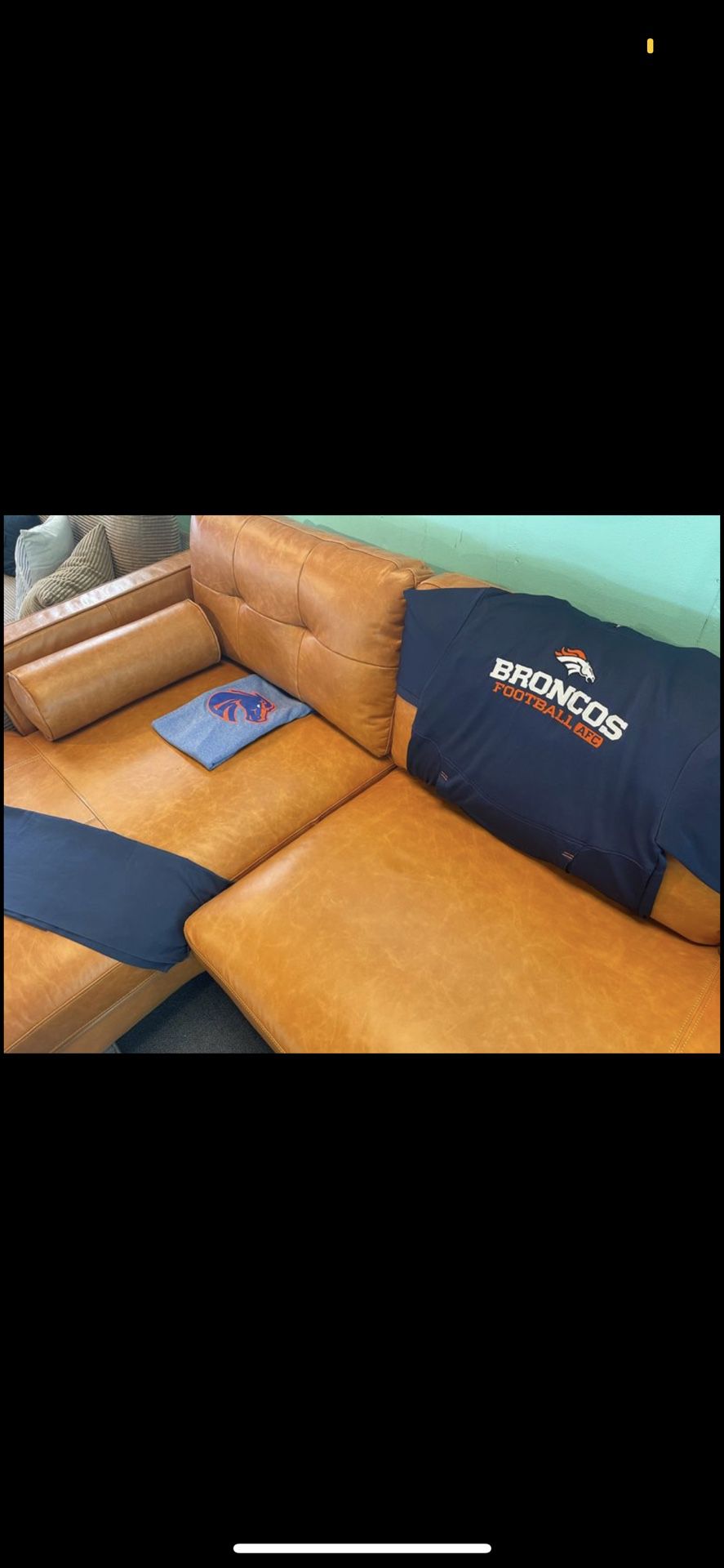 Root for the Broncos with a Beautiful caramel color leather Sectional 🧡💙🧡💙🧡💙