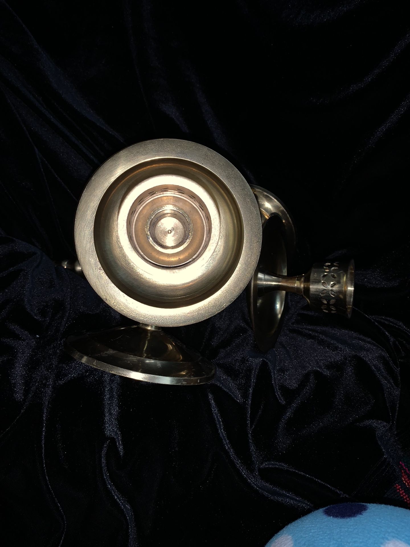 Brass wall candle holders.