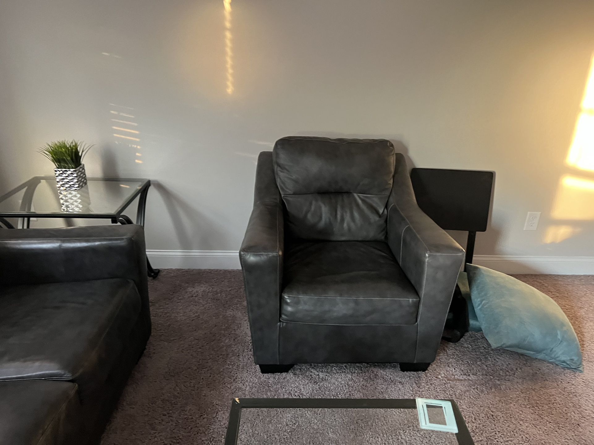 Dark Gray Leather couch and chair 