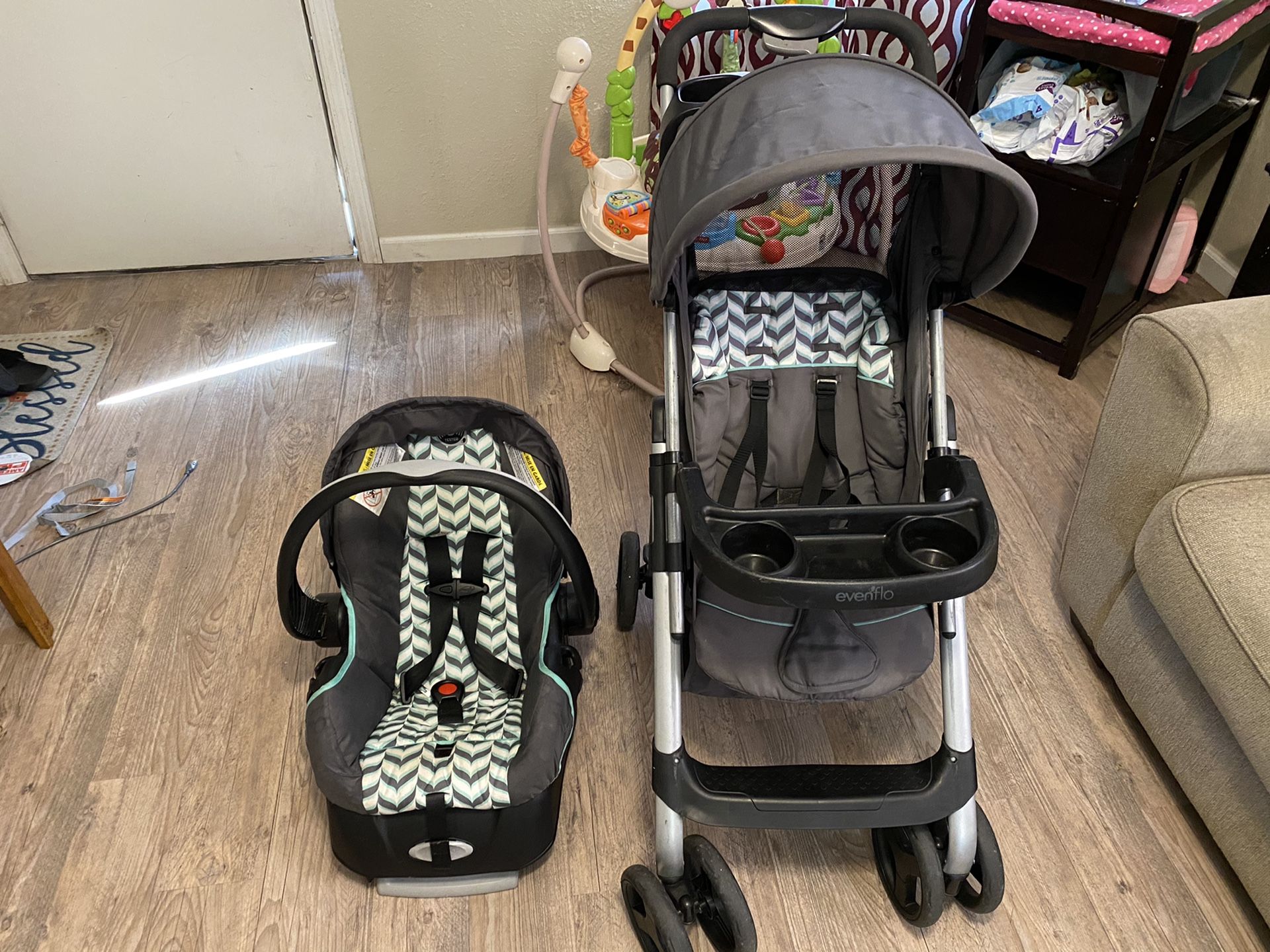 Evenflo car seat, base and stroller
