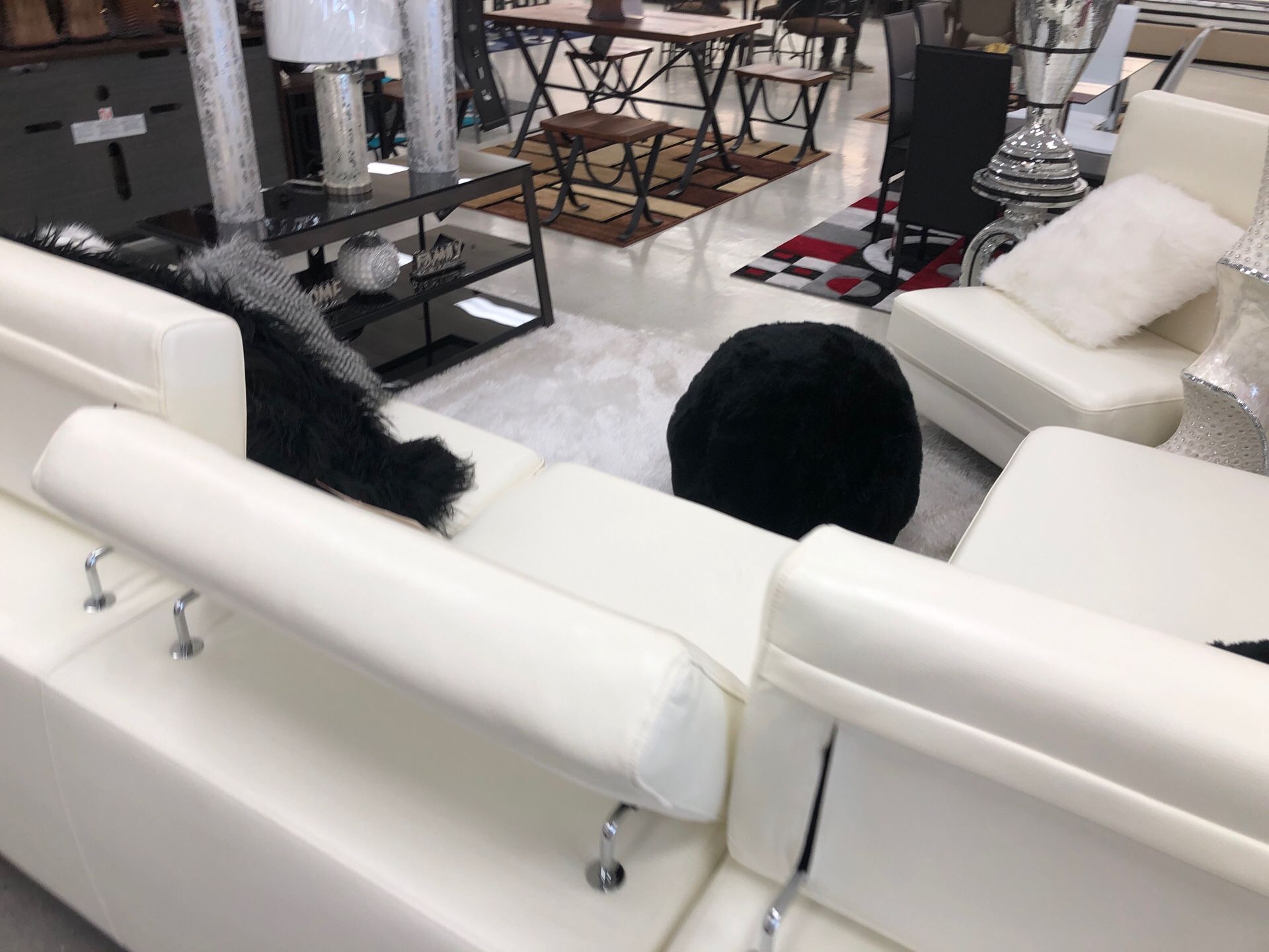 White sectional with adjustable headrest