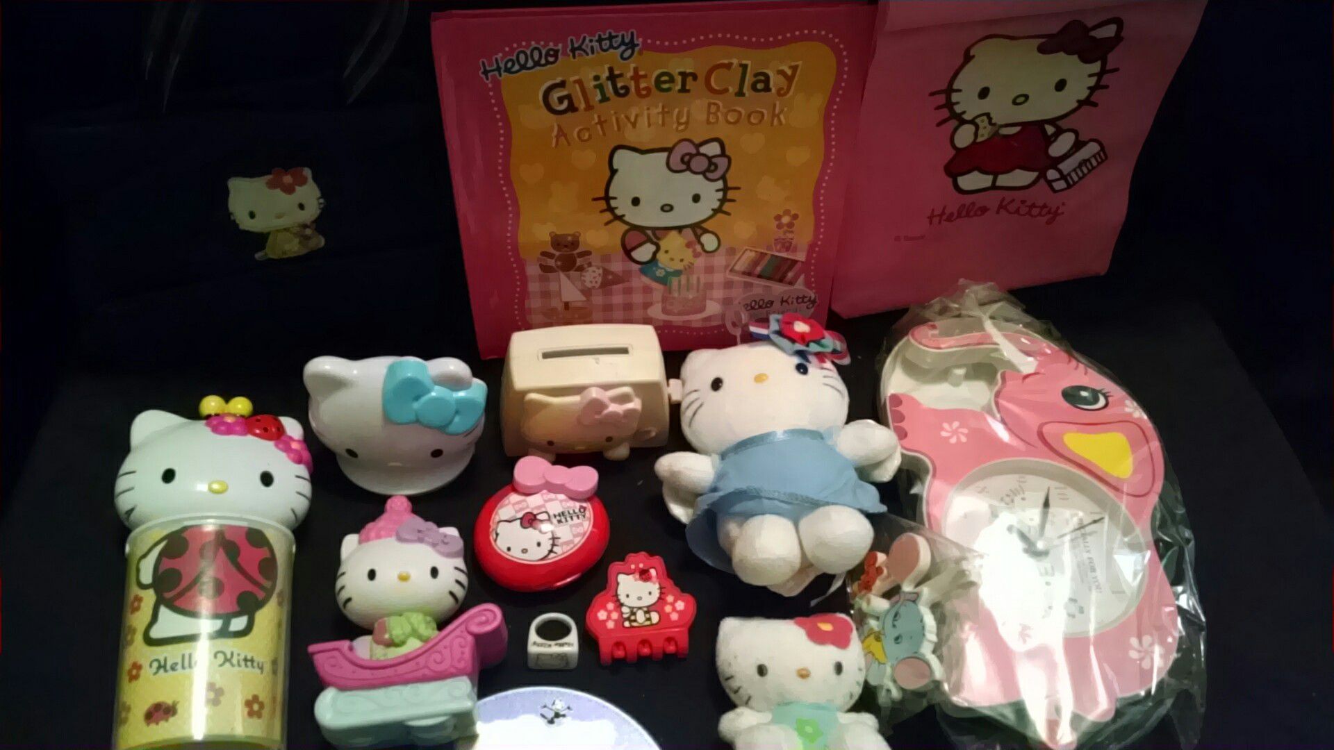 Hello Kitty purse, clock, lunch bag, CD, toys, books, ring & more