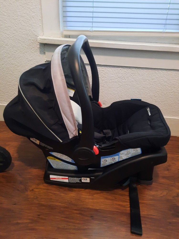 Graco FastAction Fold SE Travel System With SnugRide Infant Car Seat And Stroller