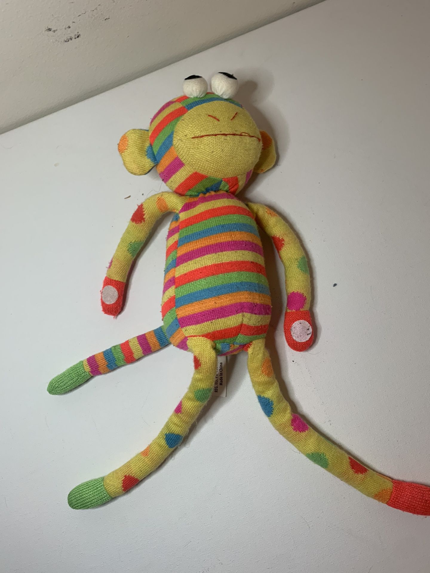 rainbow funny looking stuffed animal monkey
