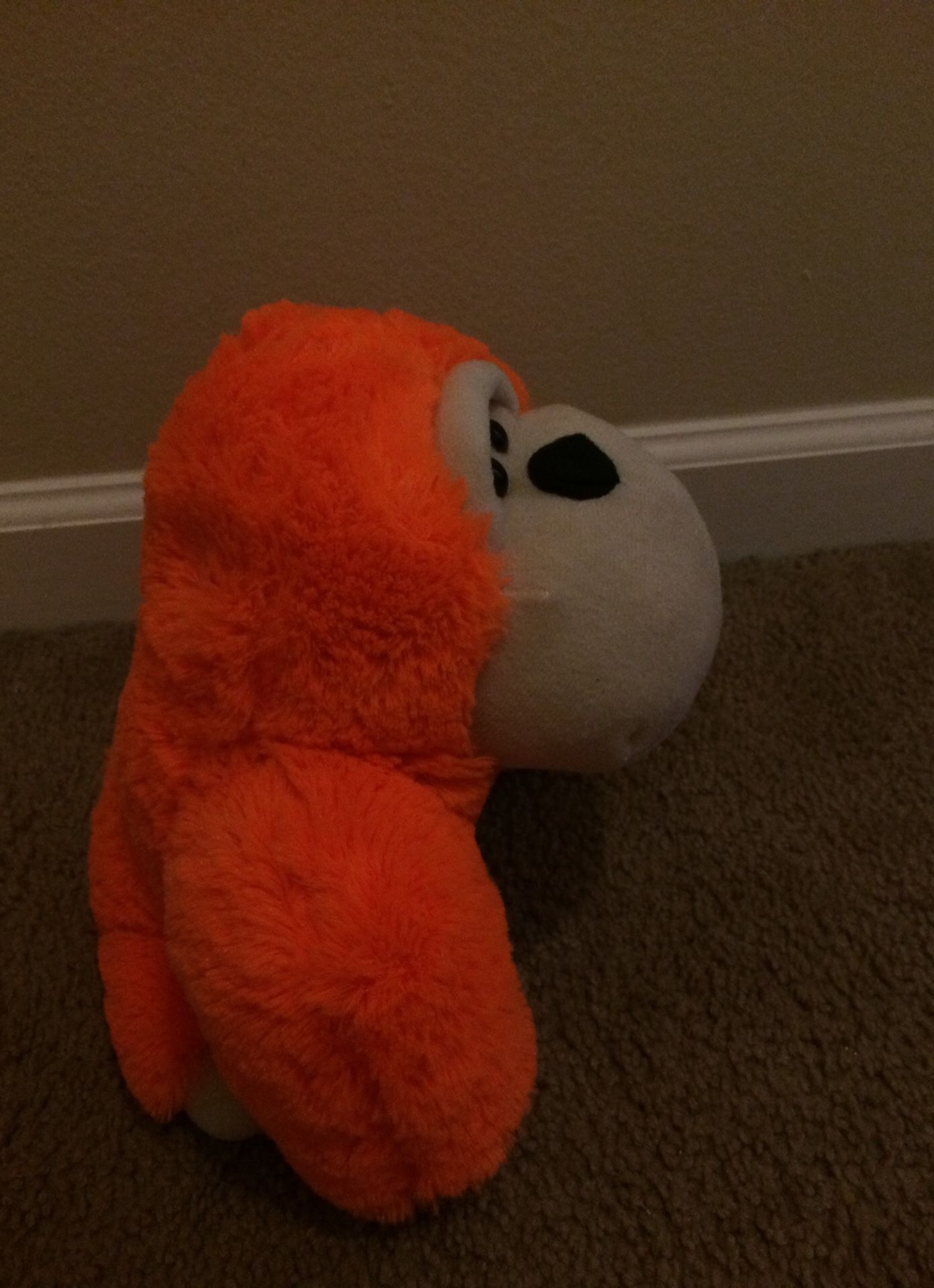Orange monkey stuffed animal toy