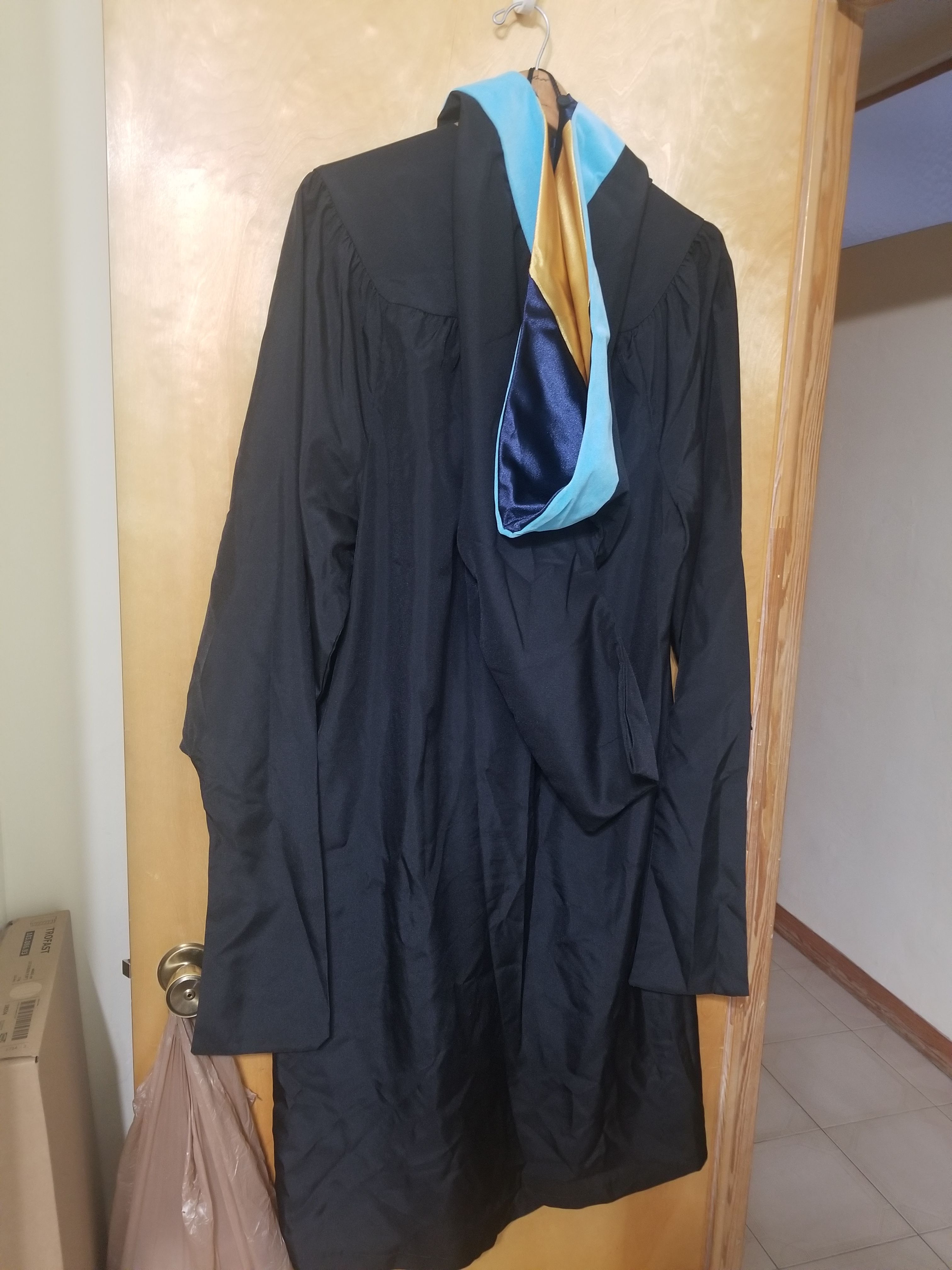 Masters graduation gown. Edu tassel and dressing. Worn once in perfect condition.
