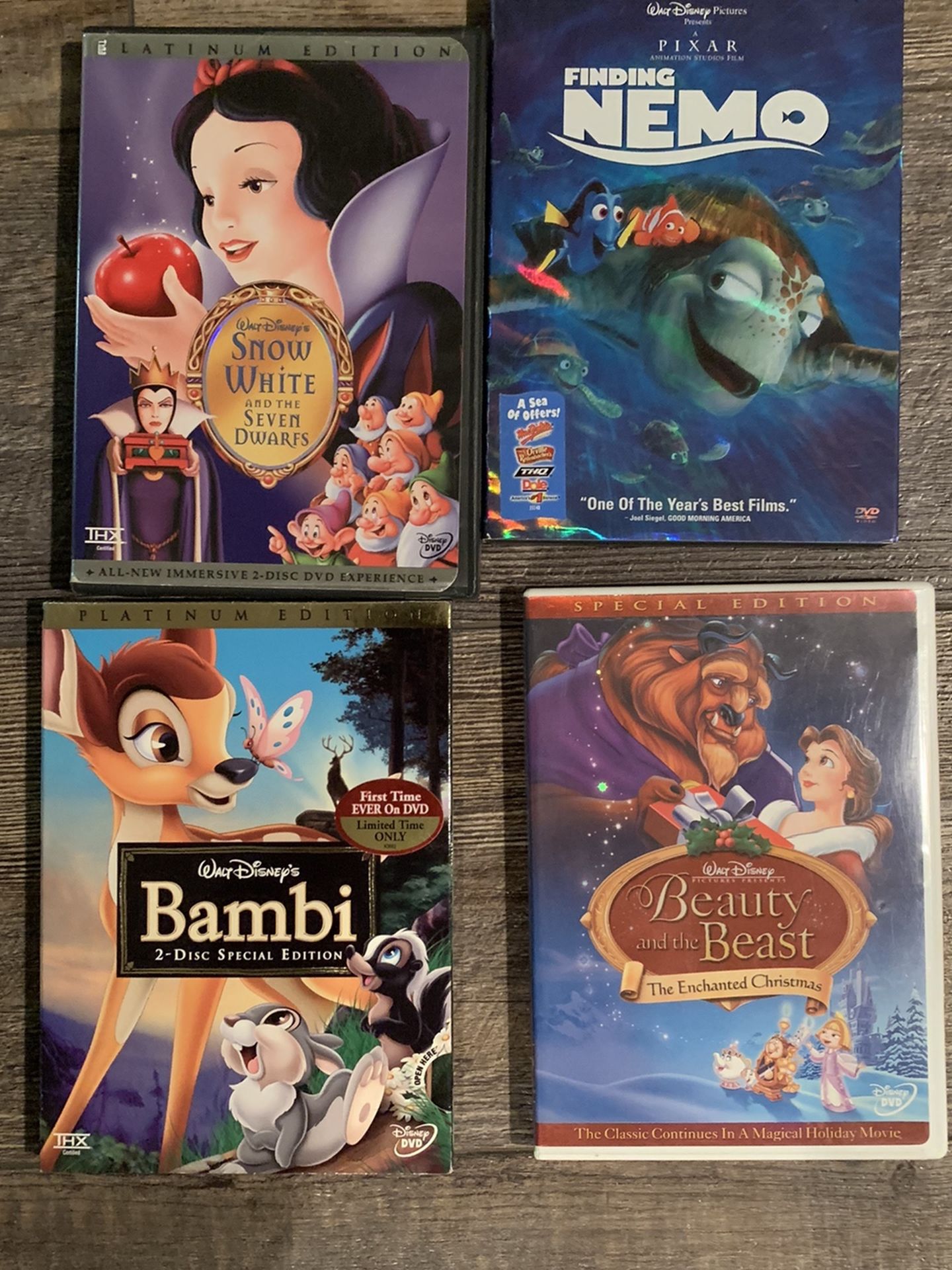 Disney DVDs Unopened Special Edition Bambi, with Snow White, Beauty & The Beast- En V chanted Christmas, Finding Nemo B