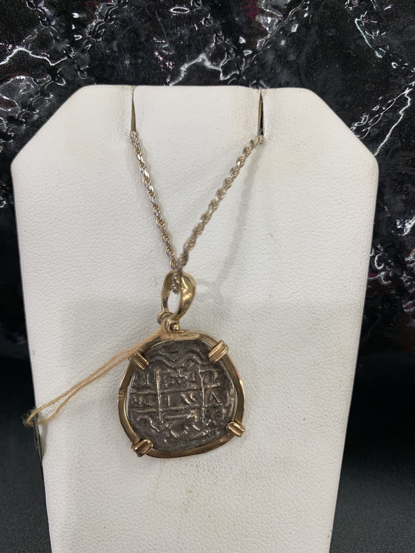 Atocha silver coin pendant in gold bezel with silver chain
