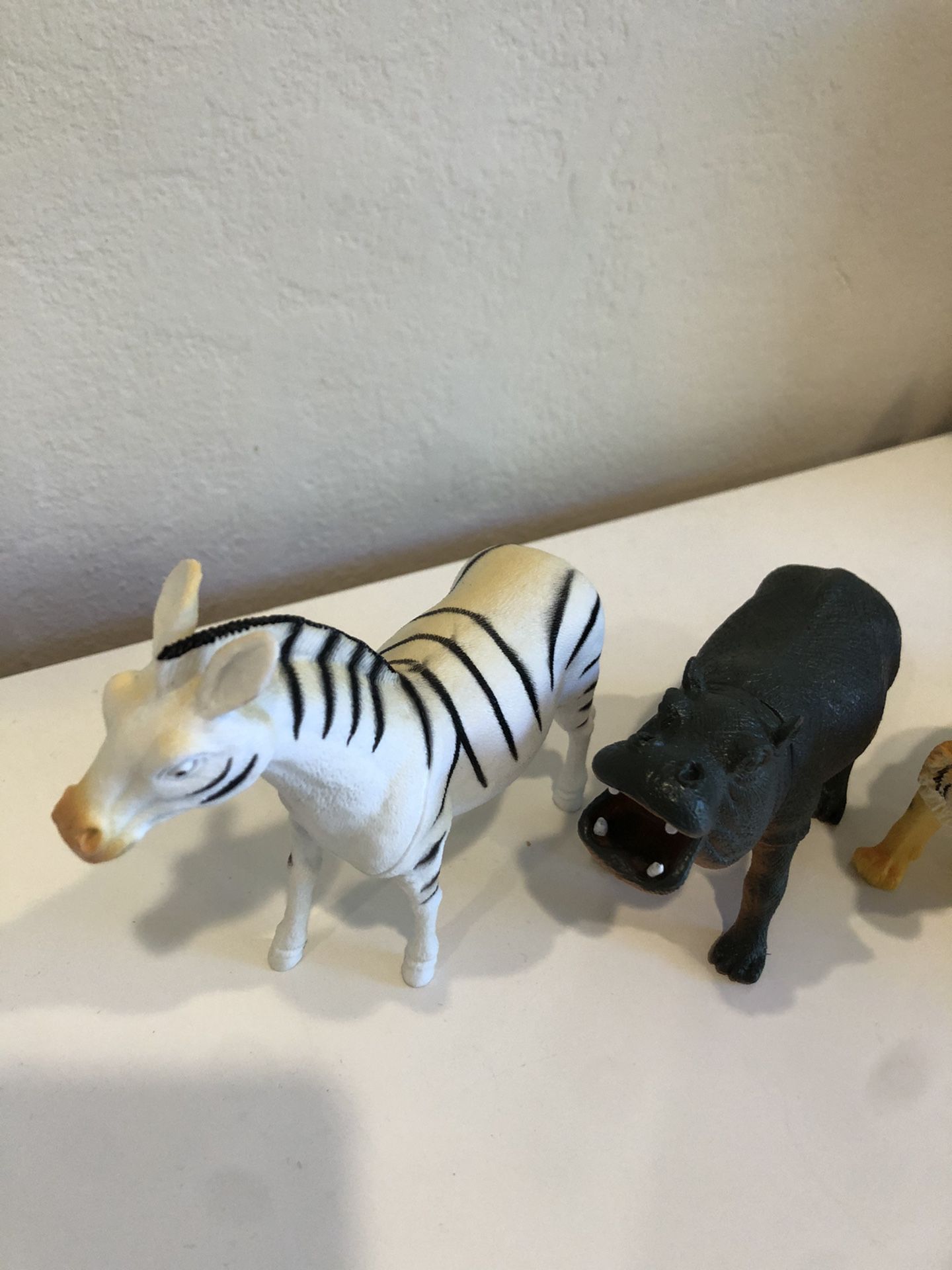 A lot of medium size zoo animals zebra, hippo, tiger, lion, monkeys toys $10 for all