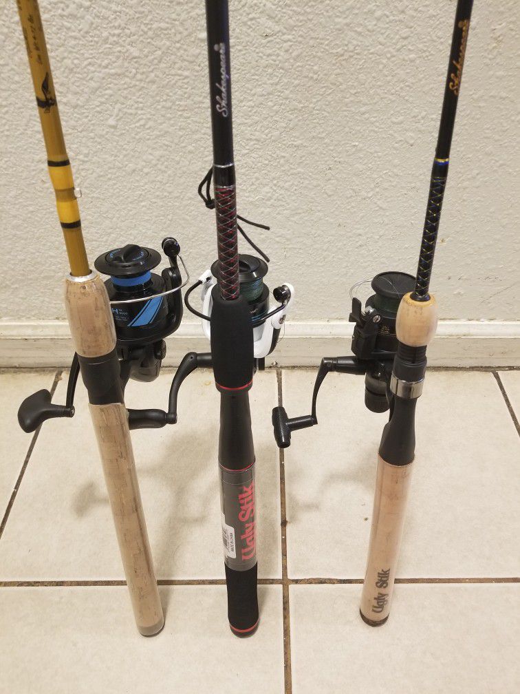 fishing pole with reels both are ugly stik & Eagle claw  reels are pflueger penn  shimano both ugly stik 7ft & 6"6ft nice set up 