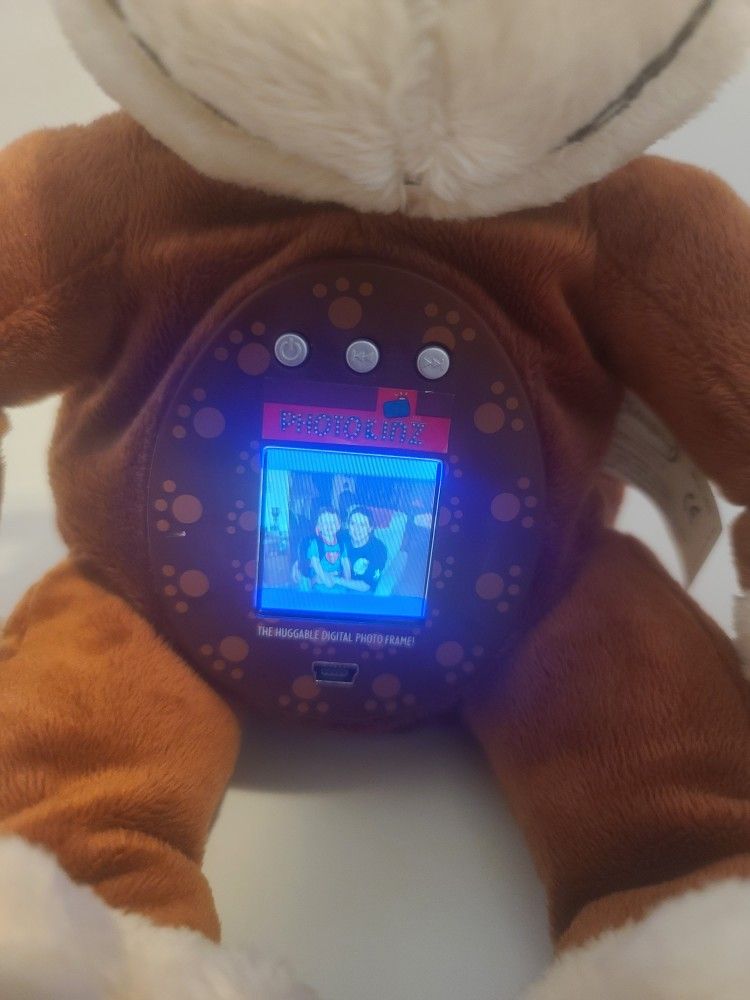 MONKEY Photokinz Huggable Digital Photo Frame Fun Loving Companion it do not come with the cable to connect to the PC
