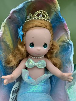 Disney Precious Moments Ariel in shell doll.  Soft body and vinyl head and arms.  Approx 10”H. She is in excellent condition.  Thumbnail