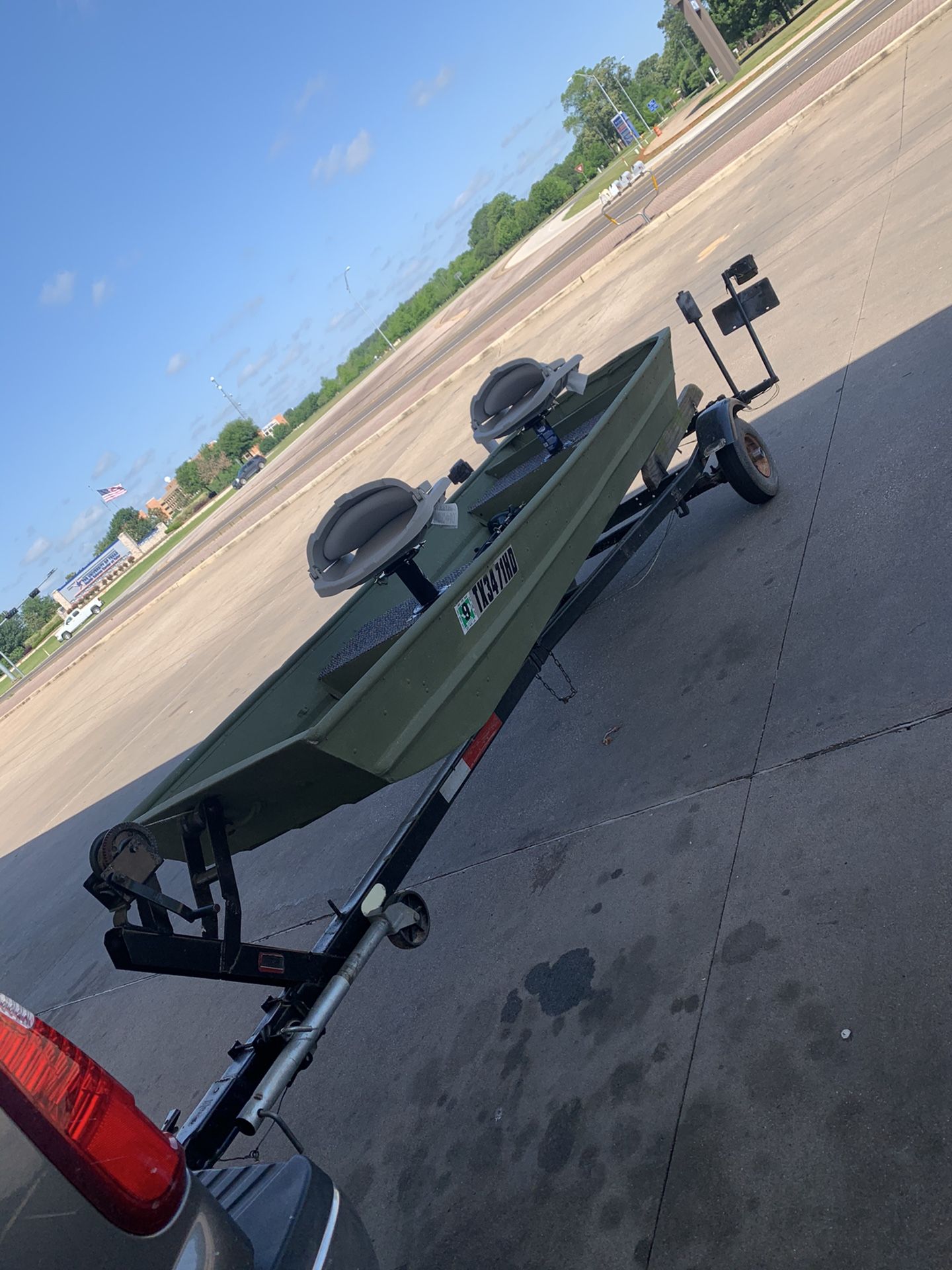 10ft john boat with trailer, trolly and 20mph motor. Clean title