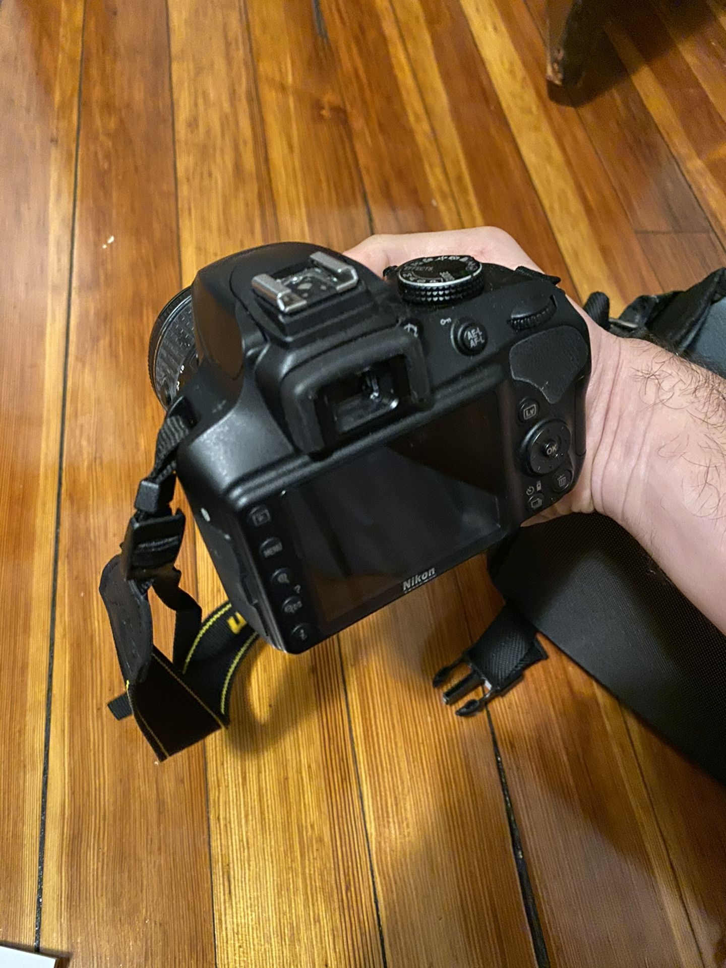 Nikon D3400 DSLR camera with accessories
