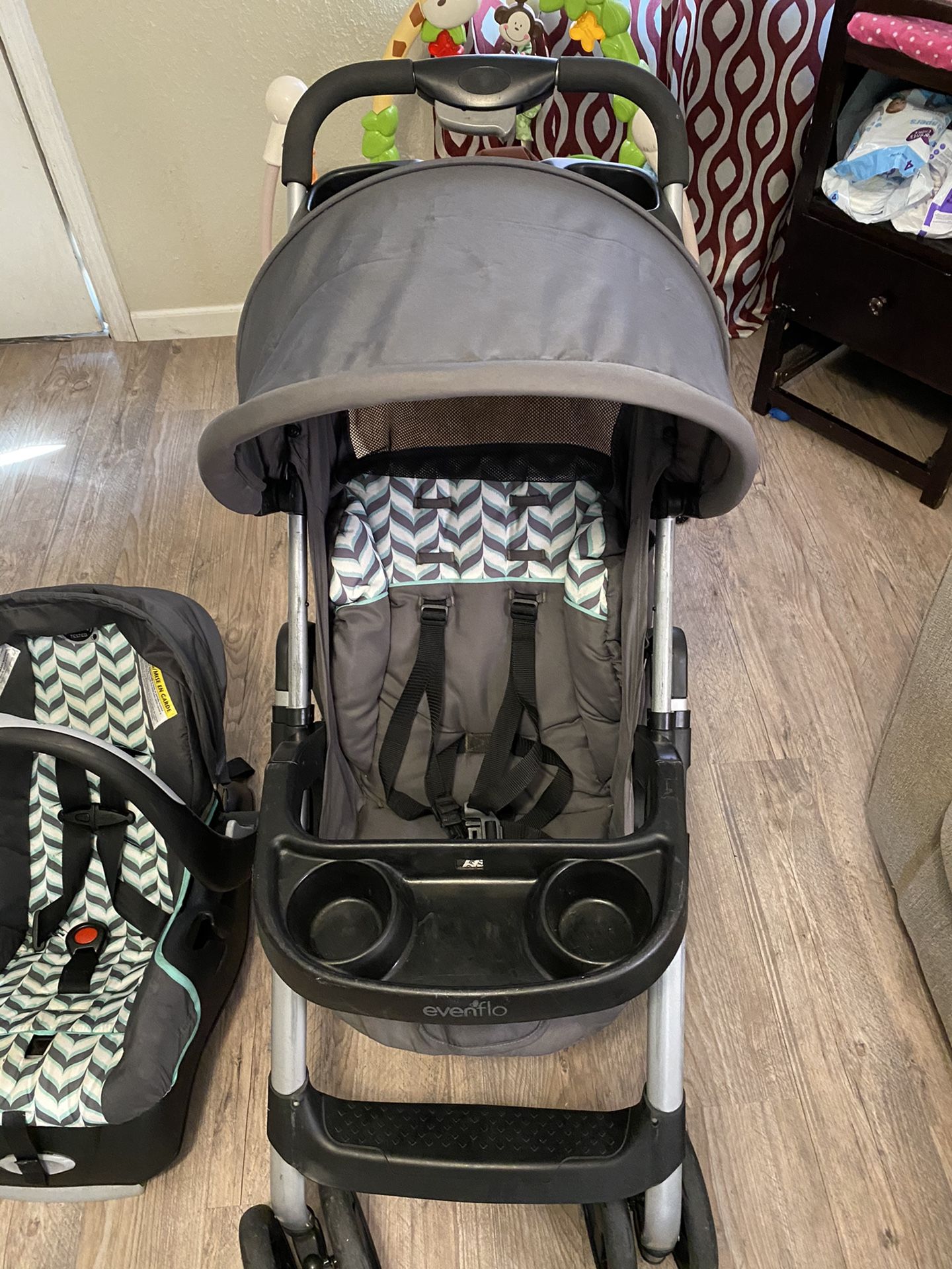 Evenflo car seat, base and stroller