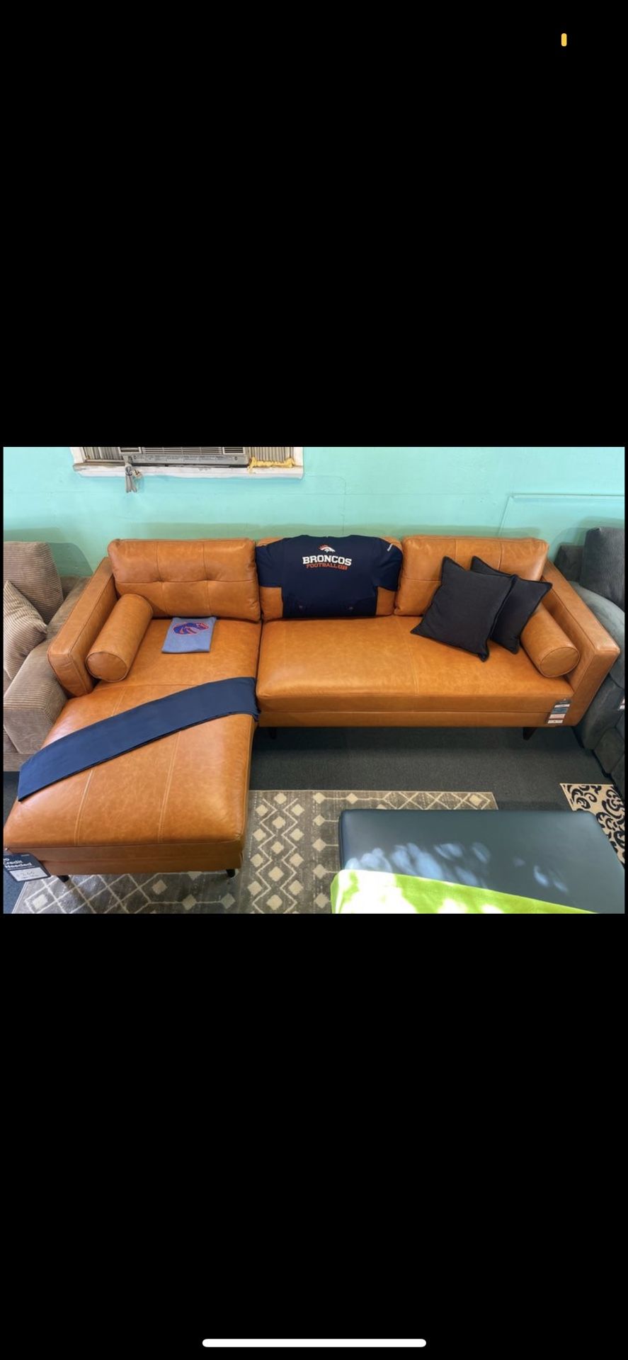 Root for the Broncos with a Beautiful caramel color leather Sectional 🧡💙🧡💙🧡💙
