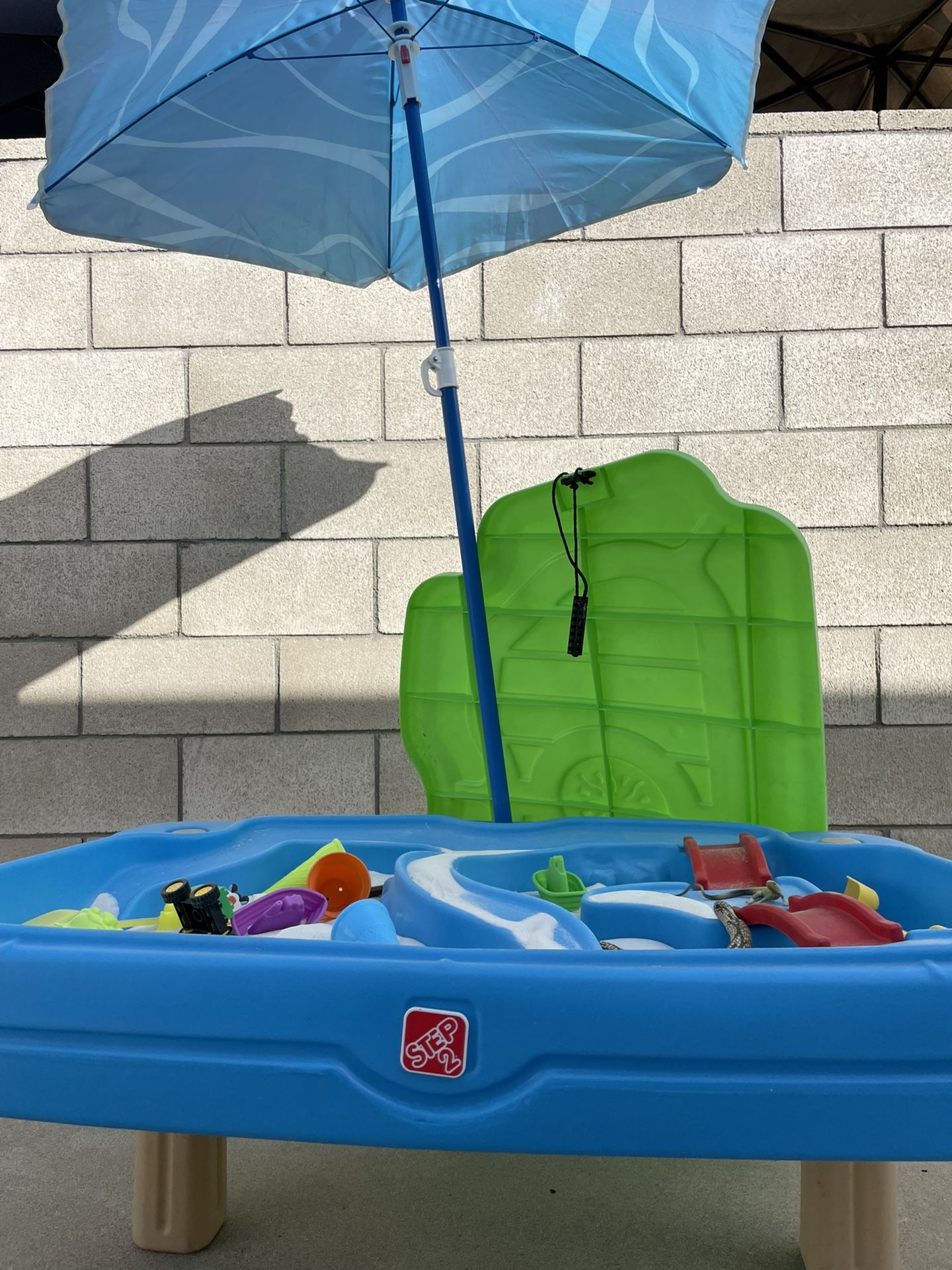 Sand Table With Toys And Umbrella