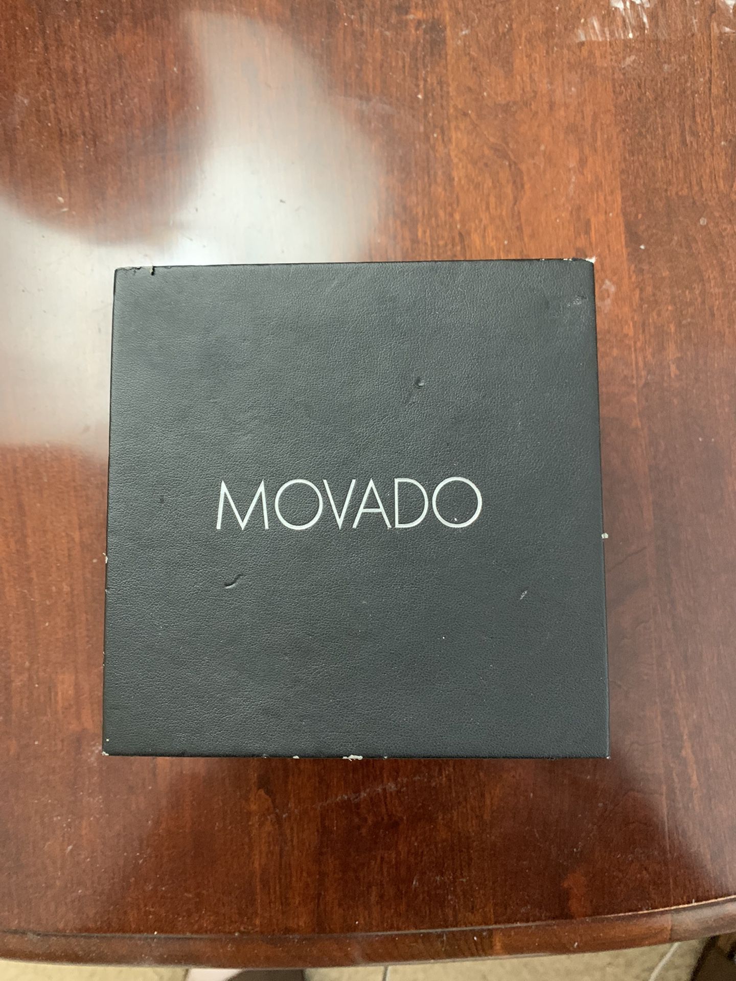 BRAND NEW Movado Watches (His & Hers) 