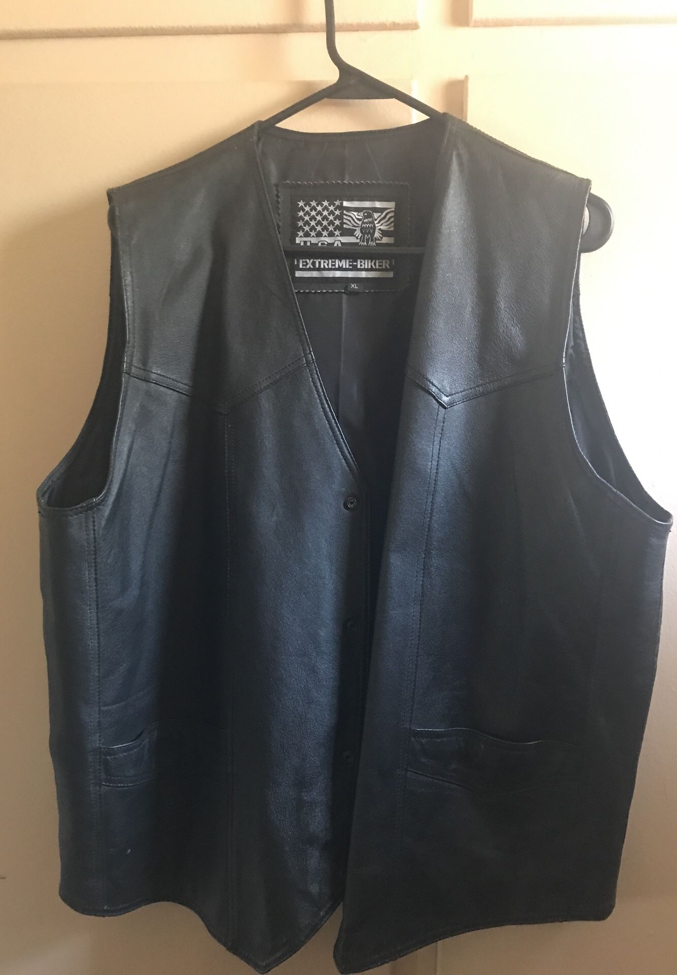 Leather vest, size Xl, USA extreme-biker, in good condition, asking $30, also Exl women’s Levi Victory outreach jacket asking $20 and and an 70’s bla
