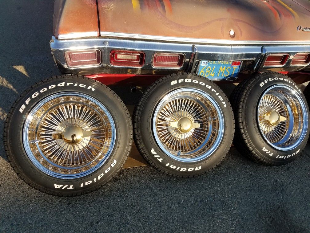 15x8 triple gold 72 spoke Daytons Bfgoodrich tires Cadillac lowrider